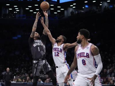 Russell consigue 22 puntos y Nets vencen a 76ers por 100-96